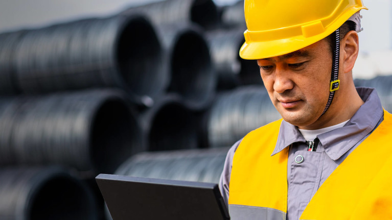 Subcontractor using a tablet on site