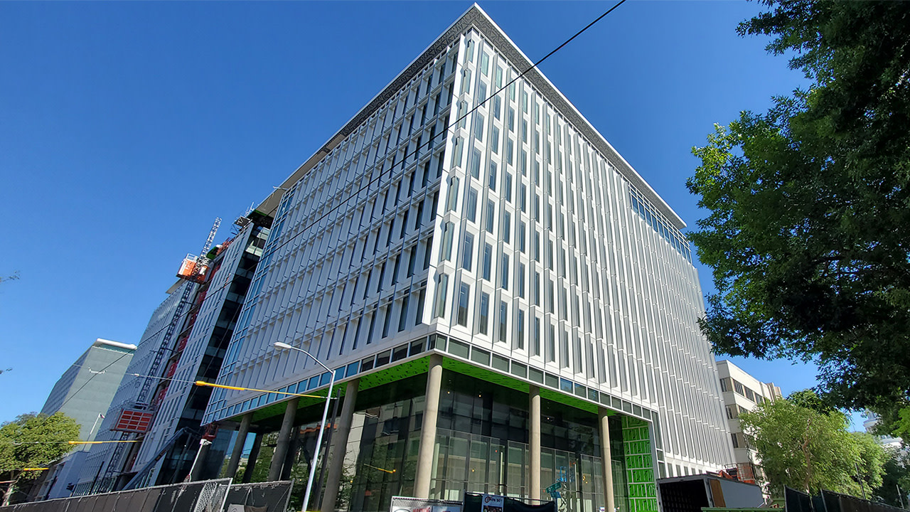 Low angle view of a building in a corner of a street