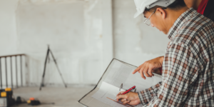 Construction administrator examining a document